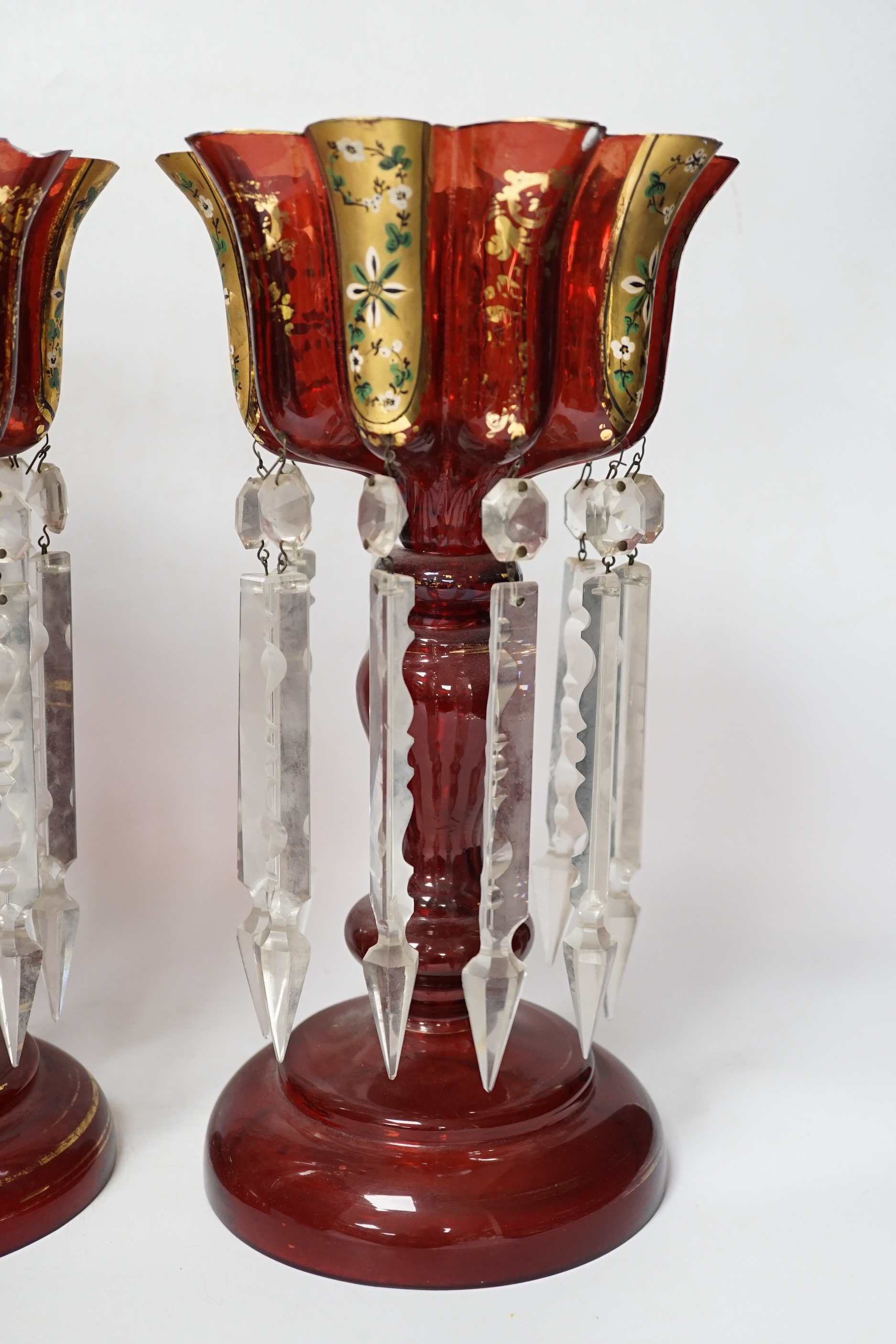 A pair of Continental overlaid ruby glass table lustres, 34.5cm